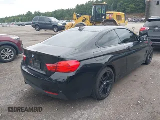 2015 BMW 4 Series 428i xDrive z VIN WBA3N9C56FK246586, wystawiony jako IAAI lot #40138540 z przebiegiem 127 512 mil mil oraz . Historia ofert i sprzedaży dostępna na DreamBid. Obrazek 4.
