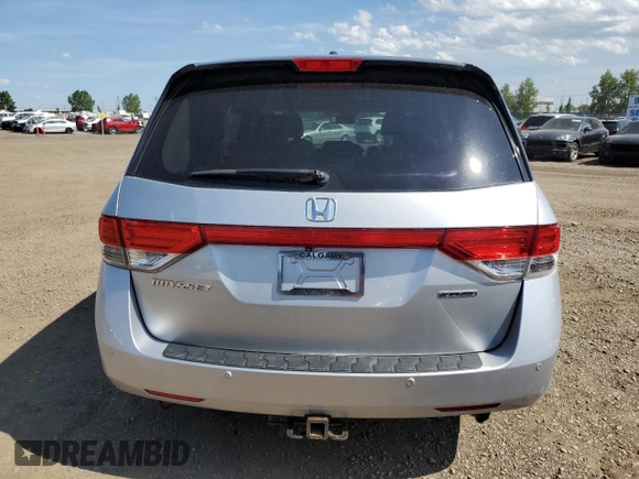 2014 Honda Odyssey Touring with VIN 5FNRL5H91EB502555, listed as a Copart auction lot 61872285 with 203,448 mi miles and Salvage title. Bid and sale history available at DreamBid. Image 6.