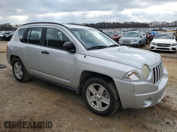 2007 Jeep Compass Sport with VIN 1J8FT47W87D211137, listed as a Copart auction lot 45294835 with 144,156 mi miles and Salvage Title. Bid and sale history available at carsss.com. Image 4.