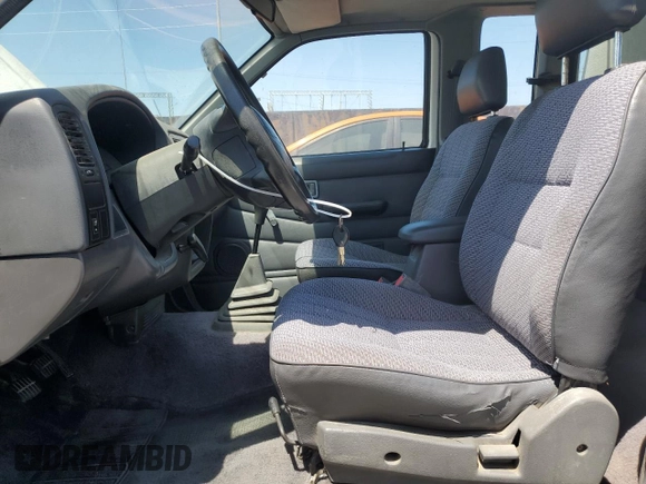 1997 Nissan Frontier XE with VIN 1N6SD16S3VC427137, listed as a Copart auction lot 57911575 with 228,542 mi miles and Clean title. Bid and sale history available at DreamBid. Image 7.