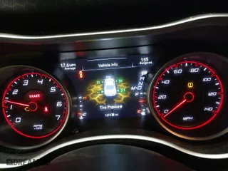 2016 Dodge Charger SXT with VIN 2C3CDXJG9GH180966, listed as a IAAI auction lot 41243491 with 127,235 mi miles. Bid and sale history available at carsss.com. Image 7.