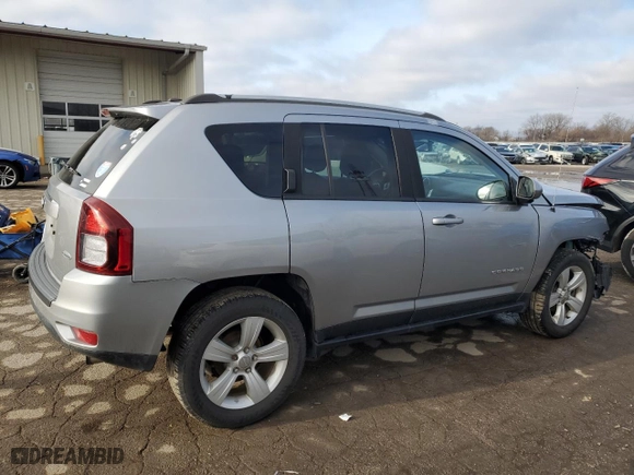 2016 Jeep Compass Latitude with VIN 1C4NJDEB8GD757624, listed as a Copart auction lot 84997714 with 140,906 mi miles and Salvage Title. Bid and sale history available at carsss.com. Image 3.