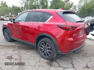 2018 Mazda CX-5 Grand Touring with VIN JM3KFADMXJ0302656, listed as a IAAI auction lot 42099173 with 125,378 mi miles and . Bid and sale history available at DreamBid. Image 3.