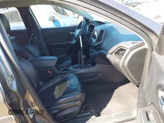 2019 Jeep Cherokee Latitude Plus with VIN 1C4PJLLB1KD201847, listed as a IAAI auction lot 41814463 with 115,927 mi miles. Bid and sale history available at carsss.com. Image 5.
