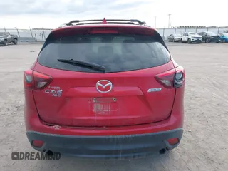 2016 Mazda CX-5 Grand Touring with VIN JM3KE4DY8G0729446, listed as a IAAI auction lot 41871207 with 89,258 mi miles. Bid and sale history available at carsss.com. Image 17.