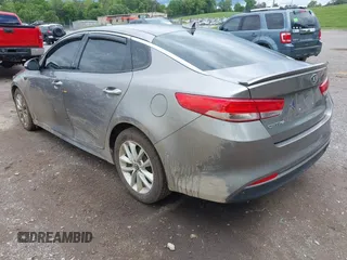 2017 Kia Optima EX with VIN 5XXGU4L34HG126243, listed as a IAAI auction lot 42180111 with 171,747 mi miles and . Bid and sale history available at DreamBid. Image 3.