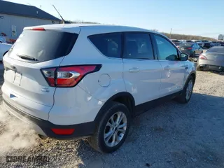 2017 Ford Escape SE with VIN 1FMCU9GD4HUB78704, listed as a IAAI auction lot 41993086 with 137,722 mi miles. Bid and sale history available at carsss.com. Image 4.