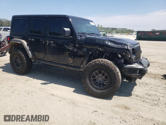 2023 Jeep Wrangler Willys with VIN 1C4HJXDG7PW520719, listed as a Copart auction lot 68978644 with 35,667 mi miles and Clean Title. Bid and sale history available at DreamBid. Image 4.