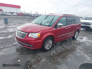 2015 Chrysler Town & Country Touring-L with VIN 2C4RC1CGXFR596830, listed as a IAAI auction lot 41672754 with 135,615 mi miles. Bid and sale history available at carsss.com. Image 2.
