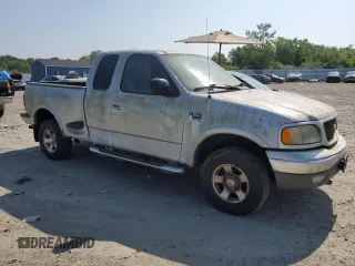 2003 Ford F-150 z VIN 2FTRX08W83CB03269, wystawiony jako Copart lot #63915625 z przebiegiem 150 127 mil mil oraz Czysty tytuł • Clean title. Historia ofert i sprzedaży dostępna na DreamBid. Obrazek 4.