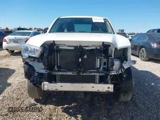 2022 Toyota Tacoma SR with VIN 3TYRX5GN5NT055120, listed as a IAAI auction lot 41687849 with 18,751 mi miles and . Bid and sale history available at DreamBid. Image 12.