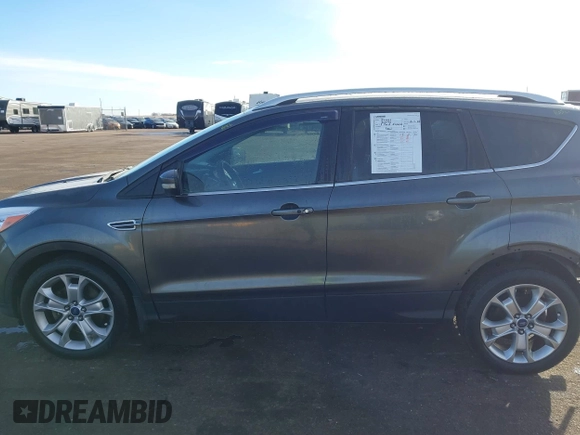 2015 Ford Escape Titanium с VIN 1FMCU9J93FUA72603, выставлен на аукционе IAAI как лот 41631058 с пробегом 138 687 миль миль и . История ставок и продаж доступна на DreamBid. Изображение 14.