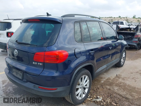 2015 Volkswagen Tiguan SE with VIN WVGAV7AX1FW508313, listed as a IAAI auction lot 42120704 with 136,405 mi miles and . Bid and sale history available at DreamBid. Image 4.