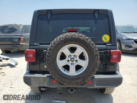 2020 Jeep Wrangler Sport with VIN 1C4GJXAGXLW237080, listed as a Copart auction lot 57769704 with 144,137 mi miles and Salvage title. Bid and sale history available at DreamBid. Image 6.