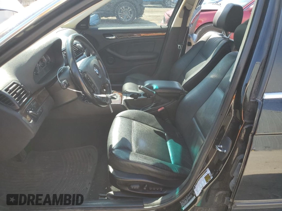 2005 BMW 3 Series 330xi with VIN WBAEW53455PN39175, listed as a Copart auction lot 75733054 with 165,015 mi miles and Salvage Title. Bid and sale history available at DreamBid. Image 7.