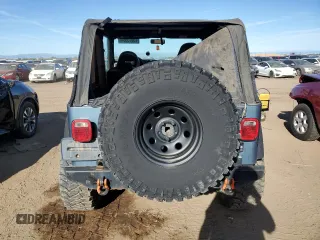1998 Jeep Wrangler Sport with VIN 1J4FY19S2WP719595, listed as a Copart auction lot 73013584 with 190,056 mi miles and Salvage Title. Bid and sale history available at carsss.com. Image 6.