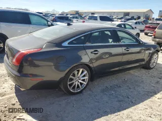 2013 Jaguar XJ Portfolio with VIN SAJWJ2GDXD8V45921, listed as a Copart auction lot 49289825 with 115,152 mi miles and Salvage title. Bid and sale history available at DreamBid. Image 3.