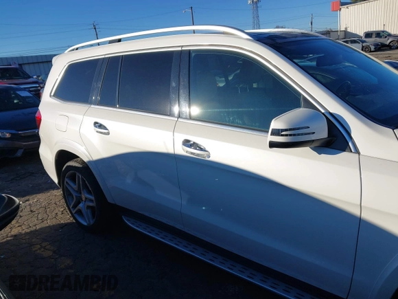 2016 Mercedes-Benz GL with VIN 4JGDF7DE6GA703049, listed as a IAAI auction lot 41063570 with 116,736 mi miles. Bid and sale history available at carsss.com. Image 13.
