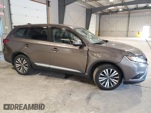2019 Mitsubishi Outlander SE with VIN JA4AD3A39KZ010618, listed as a Copart auction lot 60504615 with 102,767 mi miles and Salvage title. Bid and sale history available at DreamBid. Image 4.