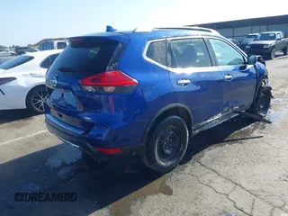 2017 Nissan Rogue SV with VIN KNMAT2MV9HP553763, listed as a IAAI auction lot 42380808 with 100,372 mi miles and . Bid and sale history available at DreamBid. Image 4.