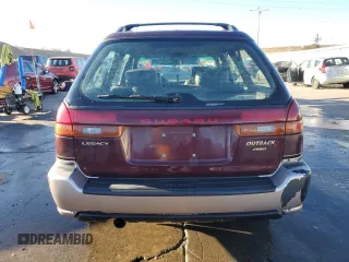 1999 Subaru Legacy Outback with VIN 4S3BG6851X7637598, listed as a Copart auction lot 83469134 with 207,692 mi miles and Salvage title. Bid and sale history available at DreamBid. Image 6.
