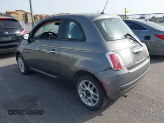 2012 FIAT 500 Pop z VIN 3C3CFFAR7CT124595, wystawiony jako IAAI lot #42257410 z przebiegiem 96 608 mil mil oraz . Historia ofert i sprzedaży dostępna na DreamBid. Obrazek 3.