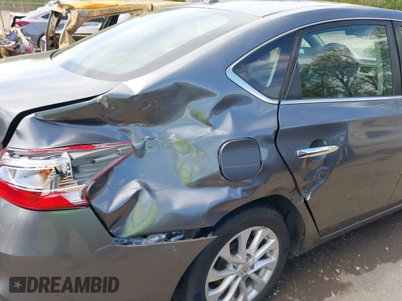 2019 Nissan Sentra S with VIN 3N1AB7AP3KY293231, listed as a IAAI auction lot 39213237 with 102,788 mi miles and . Bid and sale history available at DreamBid. Image 6.