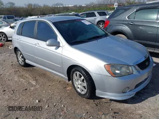 2006 Kia Spectra with VIN KNAFE161365208111, listed as a IAAI auction lot 41886193 with 292,535 mi miles. Bid and sale history available at carsss.com. Image 1.