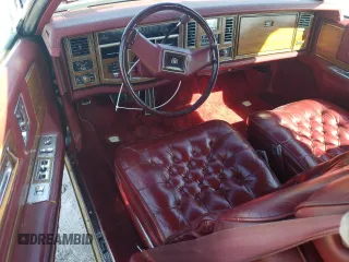 1981 Cadillac Eldorado z VIN 1G6AL5799BE635997, wystawiony jako Copart lot #45287175 z przebiegiem 46 416 mil mil oraz Czysty tytuł • Clean title. Historia ofert i sprzedaży dostępna na DreamBid. Obrazek 8.