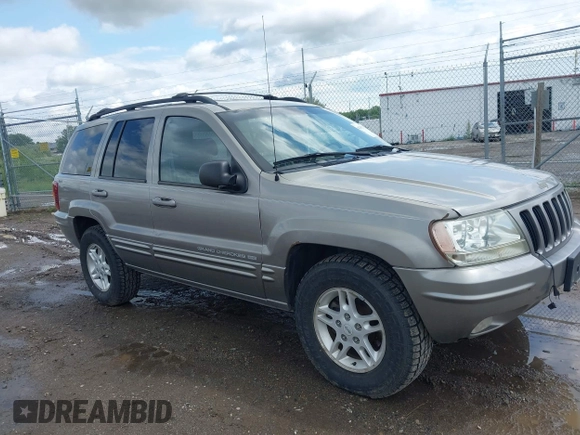 1999 Jeep Grand Cherokee Limited z VIN 1J4GW68N3XC597468, wystawiony jako IAAI lot #42353732 z przebiegiem 201 388 mil mil oraz . Historia ofert i sprzedaży dostępna na DreamBid. Obrazek 6.