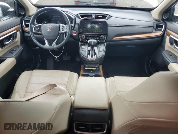 2020 Honda CR-V Touring z VIN 2HKRW2H90LH645727, wystawiony jako Copart lot #62077365 z przebiegiem 58 614 mil mil oraz Szkoda całkowita • Salvage title. Historia ofert i sprzedaży dostępna na DreamBid. Obrazek 8.
