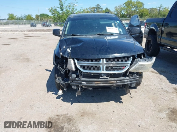 2014 Dodge Journey SXT with VIN 3C4PDCBG5ET250732, listed as a IAAI auction lot 41900940 with 144,301 mi miles. Bid and sale history available at carsss.com. Image 6.