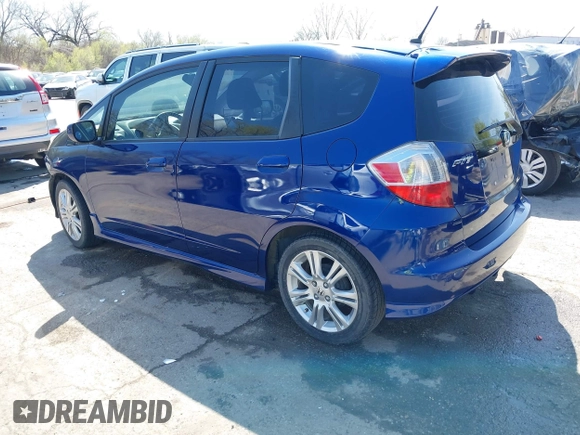 2010 Honda Fit Sport with VIN JHMGE8H4XAS018807, listed as a IAAI auction lot 41990369 with 63,151 mi miles. Bid and sale history available at carsss.com. Image 3.