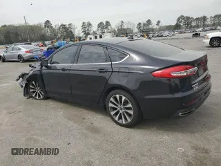 2020 Ford Fusion SE with VIN 3FA6P0T94LR190475, listed as a Copart auction lot 49952925 with 98,688 mi miles and Salvage title. Bid and sale history available at DreamBid. Image 2.