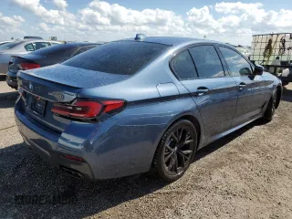 2023 BMW 5 Series M550i xDrive with VIN WBA13BK08PCN51125, listed as a Copart auction lot 76781294 with 8,855 mi miles and Non repairable. Bid and sale history available at DreamBid. Image 3.
