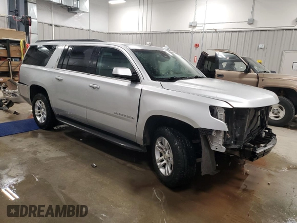 2015 Chevrolet Suburban LT with VIN 1GNSKJKC5FR719885, listed as a Copart auction lot 47192155 with 139,010 mi miles and Clean Title. Bid and sale history available at DreamBid. Image 4.
