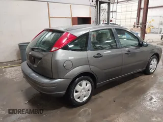 2007 Ford Focus S with VIN 1FAFP37N87W333049, listed as a IAAI auction lot 41450683 with 307,869 mi miles and . Bid and sale history available at carsss.com. Image 4.