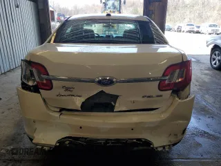 2012 Ford Taurus SEL z VIN 1FAHP2HW8CG133657, wystawiony jako Copart lot #52865895 z przebiegiem 132 876 mil mil oraz Szkoda całkowita • Salvage title. Historia ofert i sprzedaży dostępna na DreamBid. Obrazek 6.