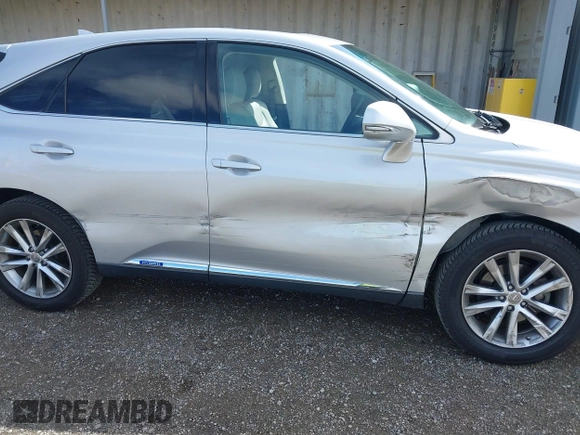 2015 Lexus RX 450h with VIN 2T2ZB1BA4FC002602, listed as a IAAI auction lot 41812562 with 166,220 mi miles and . Bid and sale history available at DreamBid. Image 6.