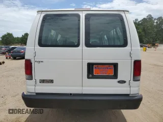 2004 Ford Econoline Passenger XL with VIN 1FBSS31L04HB37562, listed as a Copart auction lot 60328625 with 130,252 mi miles and Salvage title. Bid and sale history available at DreamBid. Image 6.