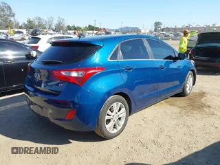 2014 Hyundai Elantra GT with VIN KMHD35LHXEU230812, listed as a IAAI auction lot 41855509 with 122,729 mi miles. Bid and sale history available at carsss.com. Image 4.