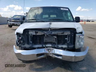 2014 Ford Econoline Passenger XL with VIN 1FBNE3BL2EDA82379, listed as a Copart auction lot 61391474 with 77,151 mi miles and Salvage Title. Bid and sale history available at carsss.com. Image 5.
