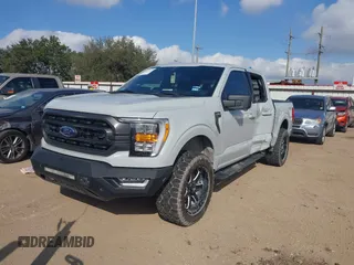 2023 Ford F-150 XL with VIN 1FTFW1E84PFA28761, listed as a IAAI auction lot 41532863 with 32,929 mi miles. Bid and sale history available at carsss.com. Image 2.