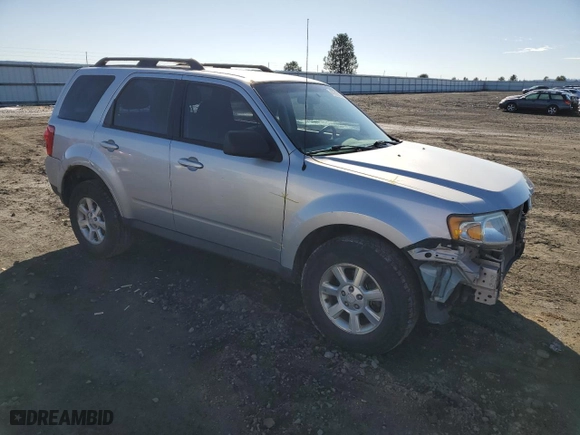 2010 Mazda Tribute Sport with VIN 4F2CY9C7XAKM03394, listed as a Copart auction lot 47975075 with 145,286 mi miles and Salvage Title. Bid and sale history available at carsss.com. Image 4.