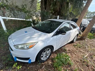 2015 Ford Focus SE with VIN 1FADP3F21FL338821, listed as a Copart auction lot 54631415 with 84,648 mi miles and Salvage Title. Bid and sale history available at carsss.com. Image 2.