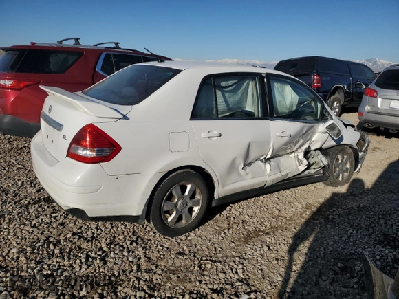 2007 Nissan Versa 1.8 SL with VIN 3N1BC11E57L414097, listed as a Copart auction lot 46945525 with 81,788 mi miles and Salvage Title. Bid and sale history available at carsss.com. Image 3.