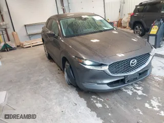 2021 Mazda CX-30 Select with VIN 3MVDMBBL8MM312187, listed as a IAAI auction lot 41100660 with 52,265 mi miles. Bid and sale history available at carsss.com. Image 1.