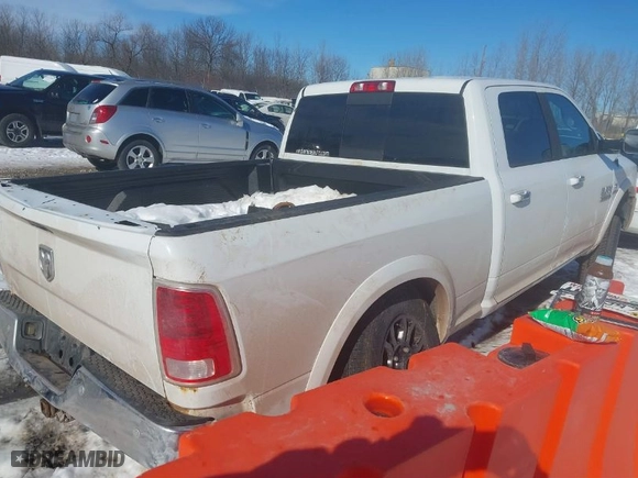 2016 Ram 2500 Laramie with VIN 3C6UR5FL8GG373161, listed as a IAAI auction lot 41568113 with 197,340 mi miles. Bid and sale history available at carsss.com. Image 4.