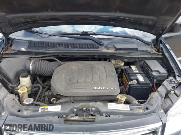 2014 Chrysler Town & Country Touring with VIN 2C4RC1BG2ER206979, listed as a IAAI auction lot 42200266 with 217,610 mi miles and . Bid and sale history available at DreamBid. Image 10.