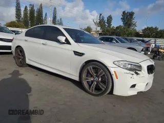 2013 BMW M5 with VIN WBSFV9C56DD096389, listed as a Copart auction lot 44951815 with 123,256 mi miles and Salvage Title. Bid and sale history available at carsss.com. Image 4.